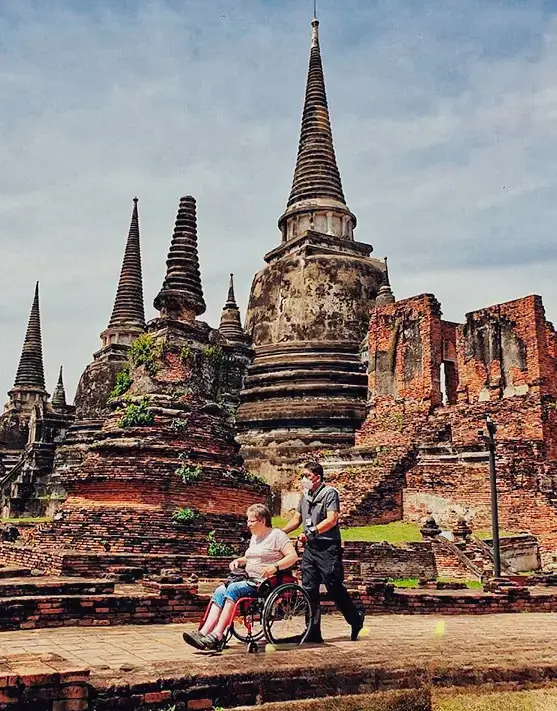 Wheelchair tourist traveling through Thailand with the support of an accessible concierge